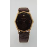 A vintage wristwatch, Maurice Lacroix, the octagonal-shaped mottled brown dial with gilt Arabic