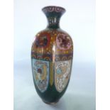 A Chinese cloisonné enamelled vase of rounded hexagonal form with drawn neck and flared rim, each