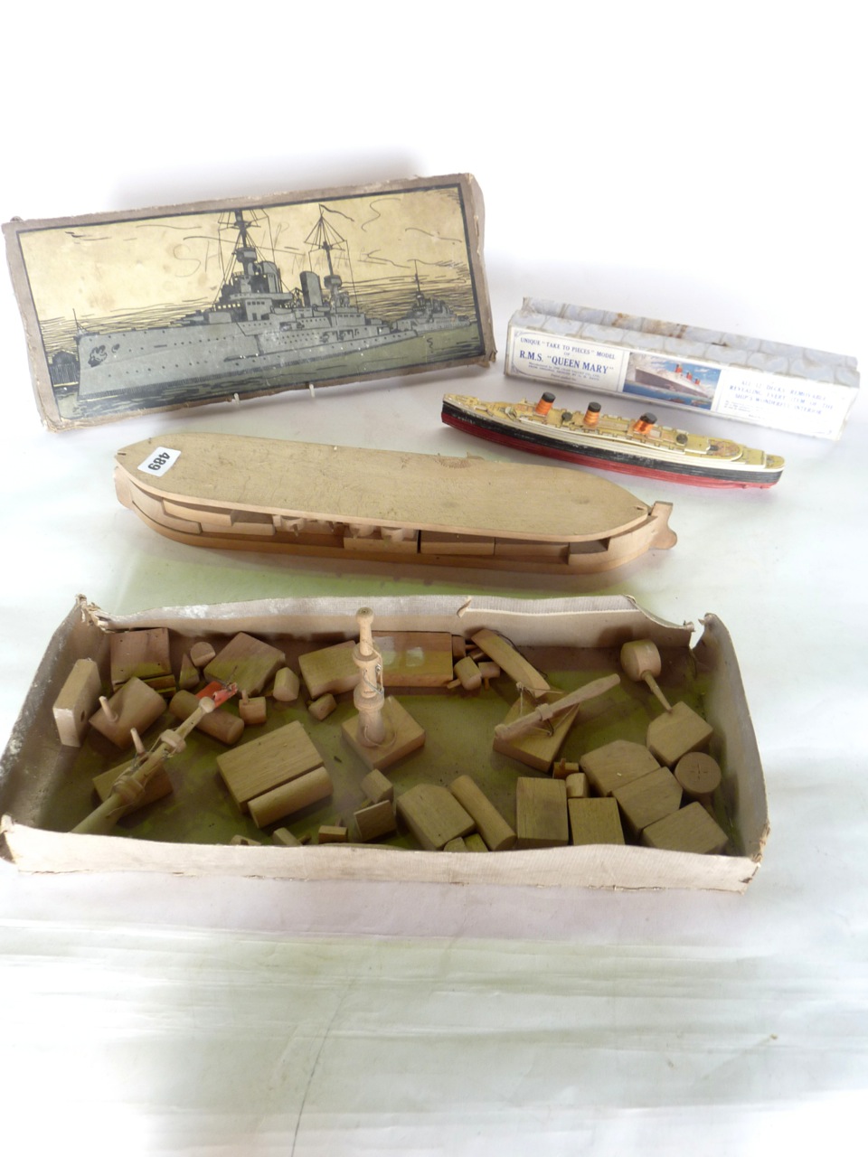 A 20th century boxed toy/building block assembly in the form of a naval destroyer together with a