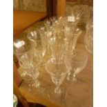 A selection of 19th century and later small drinking glasses to include a matching set of four wines