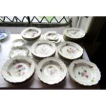 An extensive collection of 19th century Meissen dessert wares with basket weave moulded shaped
