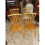 A set of four vintage Ercol light elm and beechwood Chiltern dining chairs with crossed stick