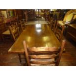 A good quality reproduction oak refectory table in the old English style, by Titchmarsh and Goodwin,
