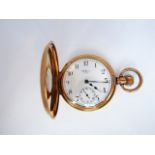 An American rose gold-plated half hunter pocket watch, Waltham U.S.A., the white enamelled dial with