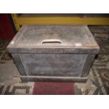 A simple vintage cast iron strongbox/safe with side carrying handles and later replacement lock