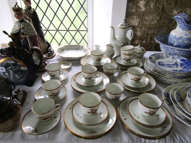 A collection of Royal Copenhagen coffee and other wares with brown and gilt rose and other floral