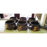 A set of six studio pottery soup bowls by Colin Pearson with brown glaze and resist decoration and