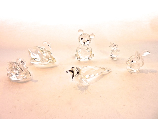 A selection of Swarovski Crystal figures to include a seated teddy bear, 6 cm tall approx together