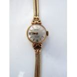 A lady's 9ct gold wristwatch, Rotary, the silvered dial with gilt baton and Arabic numerals, on a