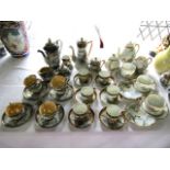 A collection of Japanese eggshell porcelain tea and coffee wares of various design including a six