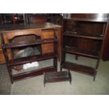 A small stained oak freestanding bookcase with four fixed shelves, together with a further stained