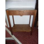 A 20th century freestanding cutlery canteen, principally in walnut veneers with cross banded