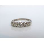 A five-stone diamond ring, set with five graduated round brilliant-cut diamonds weighing