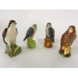 A set of four Beswick Beneagles scotch whiskey flasks in the form of birds of prey comprising the