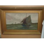 An early 20th century oil painting on canvas of a coastal scene with fishing boats, signed bottom