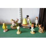 A collection of various Doulton figures including Dopey's First Kiss SW21 from the Snow White and