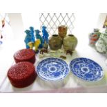 A collection of oriental ceramics including a pair of 19th century blue and white plates with