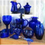 A collection of Bristol Cobalt Blue glass to include a jug, lidded condiment pot and mug, all boxed,