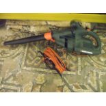 A Black & Decker 1600 watt electric blower/vac