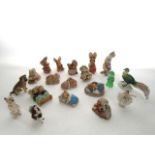 A Royal Doulton model of a begging terrier HN2589, together with further small ceramic figures, a