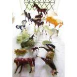 A collection of Beswick model horses including a matt glazed palomino example, a grey standing horse