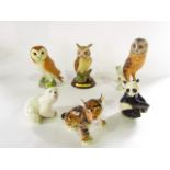 A Beswick model of a barn owl with impressed number to base 1046, two further matt glazed models