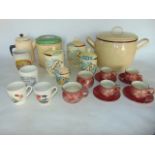 A large collection of 20th century kitchenalia to include various stoneware mixing bowls, enamel