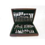 A timber canteen of cutlery containing a quantity of George Butler & Company stainless steel