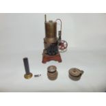 A small German stationary steam engine attributed to makers Bing, stamped Made in Germany with