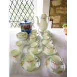 A collection of Royal Worcester coffeewares with printed floral border decoration comprising