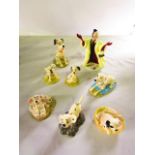 A collection of boxed Royal Doulton characters from Disney's 101 Dalmatians series including Cruella