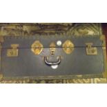 A vintage fibre cabin trunk together with a small tan leather case, two others, two cash boxes and a