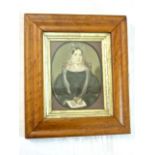 A good quality 19th century portrait minature of oval form showing half length study of a lady in