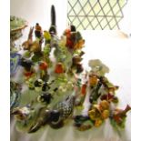 A quantity of ceramic models of birds including examples by Goebel including a kingfisher, robin,