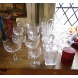 A mixed quantity of clear cut drinking glasses to include four sundae bowls by Stuart with etched