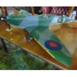 A balsa wood model Spitfire, with 1 - 4 meter wing span, complete with engine