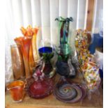 A collection of coloured glass to include a 20th century stylised pitcher in the Murano style with