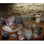 A collection of drinking glasses to include four heavy large wines with coarsely blown flared bell