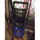A Nilfisk Centennial pressure washer and attachments model number C120.3