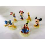 A collection of Royal Doulton figures from the Mickey Mouse collection comprising Mickey Mouse