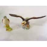 A Beswick model of a bald eagle with outstretched wings and impressed number to base 1018,