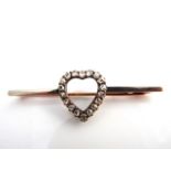 A Victorian diamond bar brooch, centred with a heart-shaped motif set with rose-cut diamonds, in