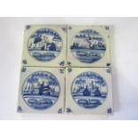 A collection of four early 19th century continental tin glazed earthenware Delft type blue and white