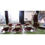 A Susie Cooper coffee service with white spiral decoration on a brick red ground comprising coffee