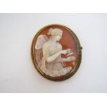 A large cameo clasp/brooch, carved with relief profile of a winged lady and an insect, within a gilt