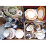 A boxed set of ten Traditional Arts china plates with red and gilt decoration on a yellow ground