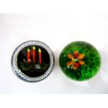 A Scottish glass Millefiori paperweight by William Mountson detailing three lit candles beneath