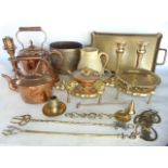 A collection of antique metal wares to include two Victorian copper kettles, a copper measure,