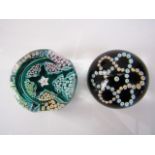 Two boxed Edinburgh Millefiori paperweights, one of rounded form with concentric floral canes