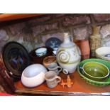 A collection of pottery wares including a wine flagon with tap to base, two matching mugs, various